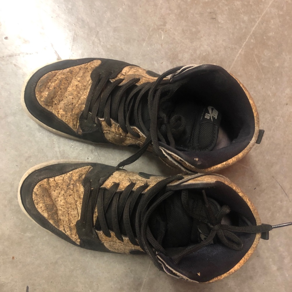 Nike Plywood/corkscrew colored sneakers with black trim.